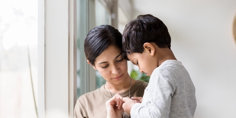 Mom comforting son